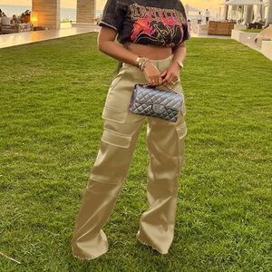 Gold metallic cargo trousers. Stretch and thick material. Cute for night out.